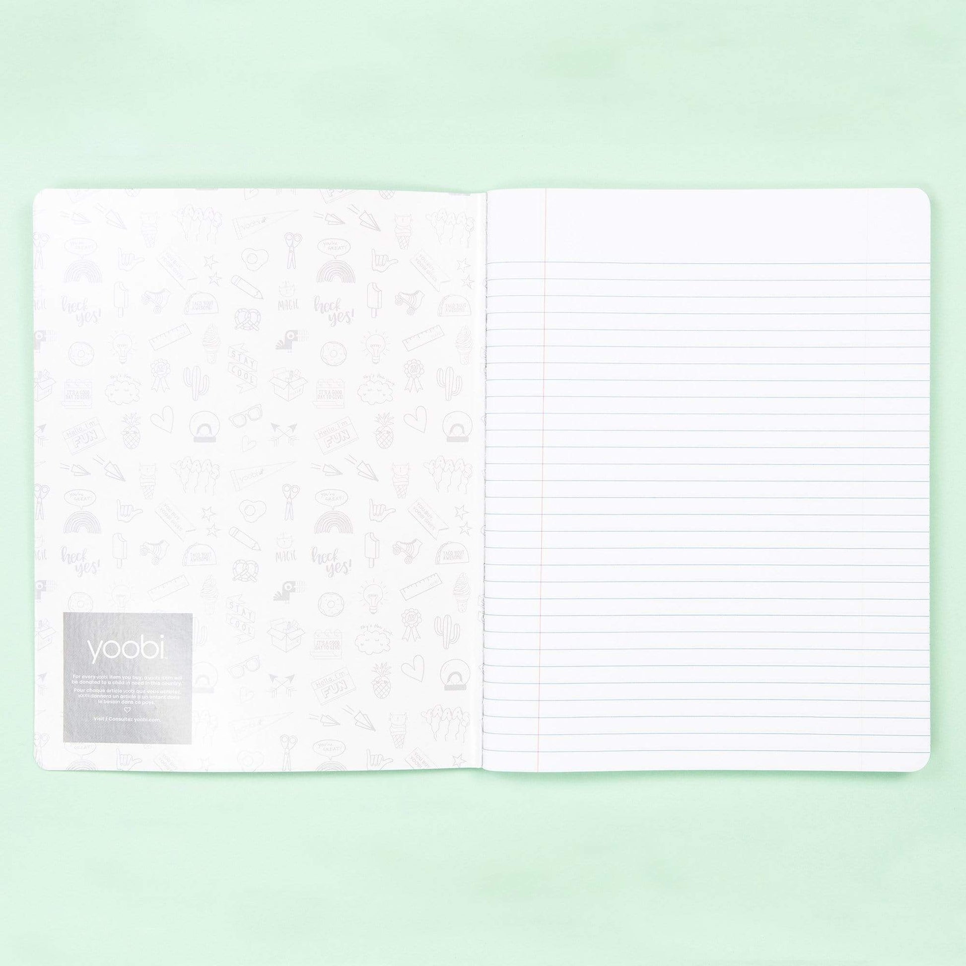 inside of open composition book showing inside of front cover